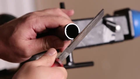 Filing file cut bicycle fork steerer tube with metal file after cutting Stock Footage 307452887