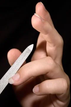 Filing Fingernails 스톡 사진