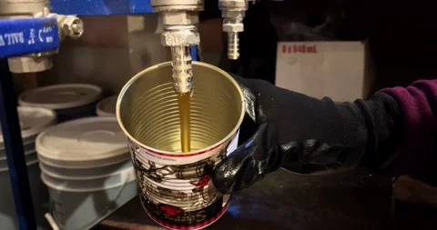 Filing a maple syrup can Video stock 180256644