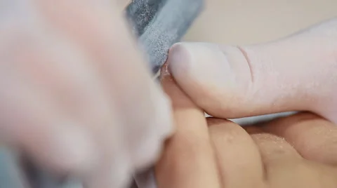 Filing of the nail plate Stock Footage 64570250