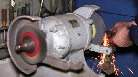 Filing a Piece of Iron with a Rotating Filing Machine Vídeo Stock 45431861