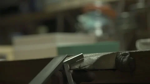 Filing piece of metal in a goldsmith Stock Footage 253304851