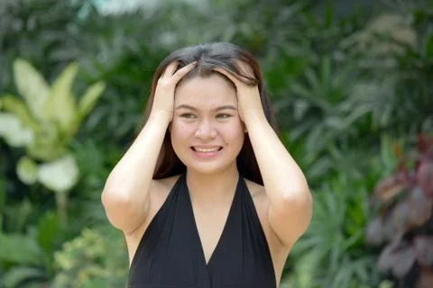 A Filipina Female Memory Problems Stock Photos