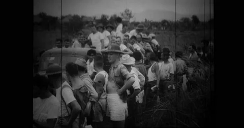 Filipino civilians being evacuated by truck Stock Footage