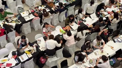 Filipino creative artists taking part in a Nationwide 'Sketchfest' event. Stock Footage 286792681