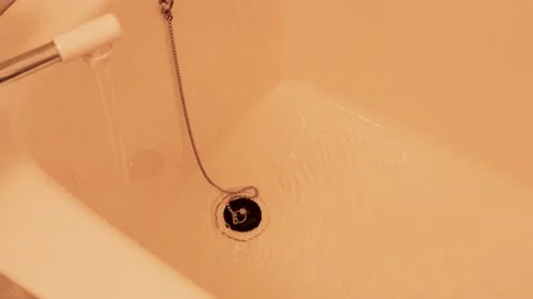 Fill a bath with hot water Stock Footage 237445202