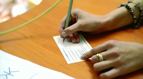 Fill a library card, registration in a library Stock Footage 47911856