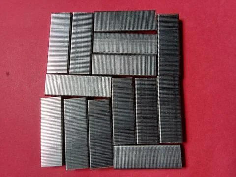 Fill Staples on red background. Stockfoto's