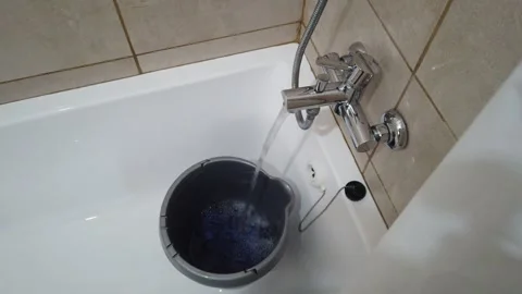Fill Water Into A Bucket in Bath Stock Footage 282672298