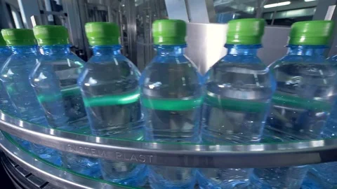 Filled and capped water bottles. Stock Footage