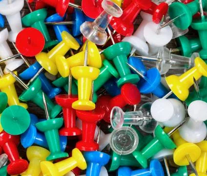 Filled frame of thumbtacks in different colors Stock Photos
