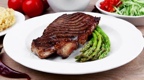 Fillet with asparagus  pasta portion 库存影片 25207465