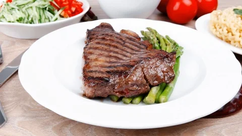 Fillet with asparagus  pasta portion Vídeos de archivo 88903583