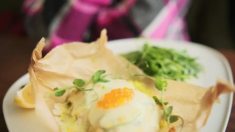 Fillet of fragrant cod with mozzarella cheese with red caviar on a white plate Stock Footage 274153730