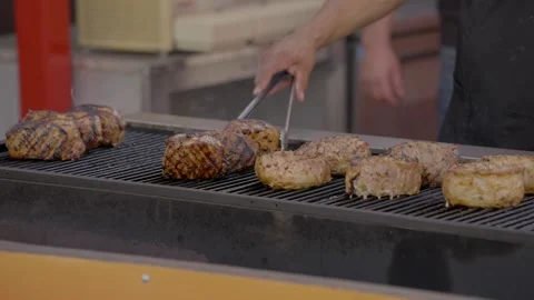Fillet mignon being seared on grill Stock Footage 256677868