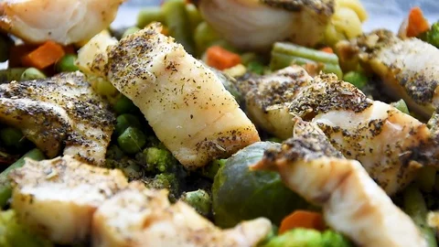 Fillet of sea fish is on a pair, mashed root vegetables and boiled Stock Footage 127418396