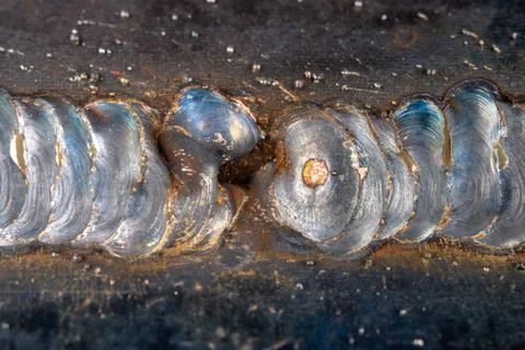 The fillet weld is placed using the MAG method. Errors in steel connections u 스톡 사진