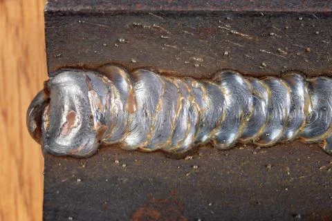 The fillet weld is placed using the MAG method. Errors in steel connections u 스톡 사진