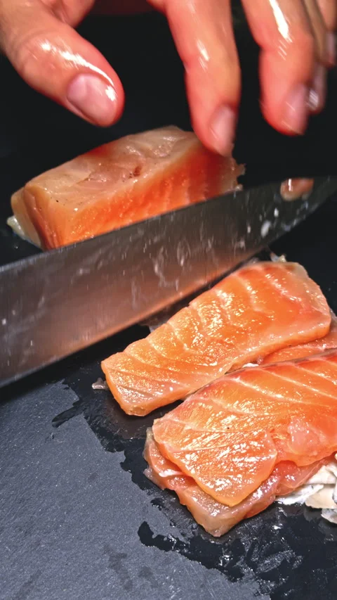 Filleting Salmon with Precision close-up Stock Footage 277103058
