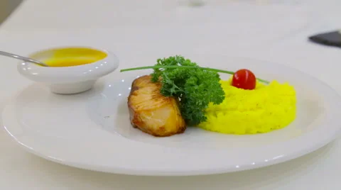 Fillets fried fish with a side dish of rice. Stock Footage 45751242