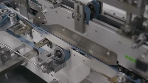 Filling and packaging tape in the printing house finished products move along Stock Footage 158386936