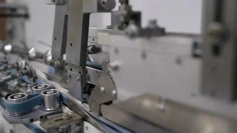 Filling and packaging tape in the printing house finished products move along Stock Footage 158387128