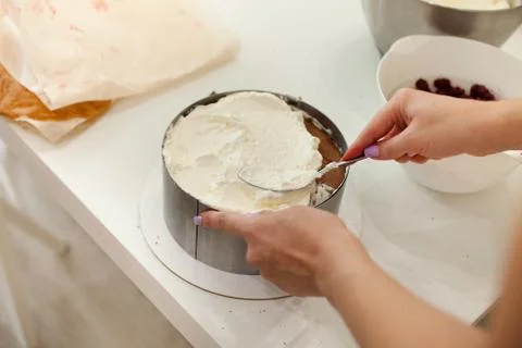 Filling and Stacking Layers. Making Cake. Stock Photos