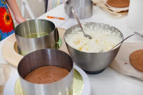 Filling and Stacking Layers. Making Cake. Stock Photos