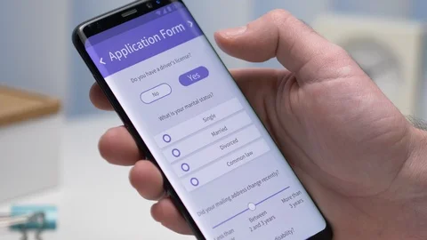 Filling an Application Form On a Smartphone Device 스톡 동영상 100910855