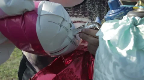 Filling Ballons With Helium Stock Footage 63532510