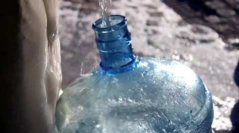 Filling the barrel with a water, close-up Stock Footage 45530277