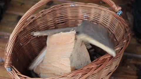 Filling basket with wood Stock Footage 39017336