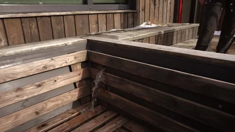 Filling the bathing container on the terrace Video stock 265088430