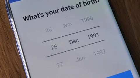 Filling birth date for age verification Stock Footage 100282698