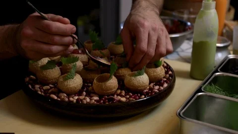 Filling bite size spheres with Tuna tartare Stock Footage 105583406