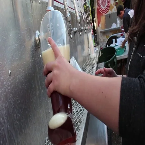 Filling a Boot with Beer Stock-Footage 69461536