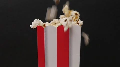 Filling box with popcorn Stock Footage 237497767