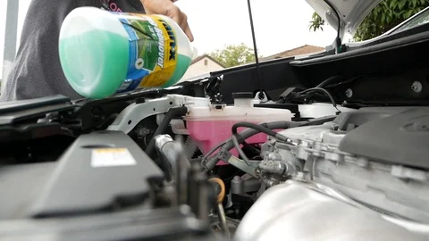 Filling car fluids Stock Footage 112730395