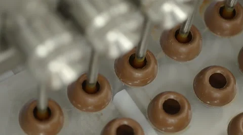 Filling chocolate pearls Stock Footage 42340205