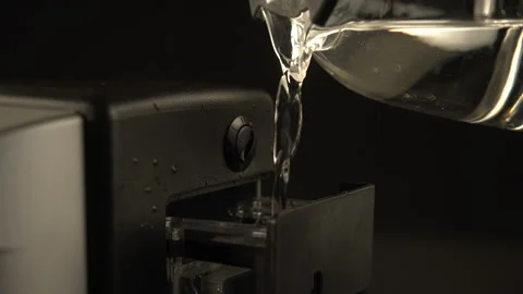 Filling the coffee machine with water Stock Footage 171639651