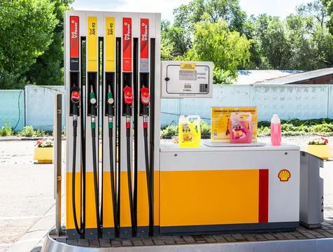 Filling column with different fuels at the Shell gas station Stock Photos