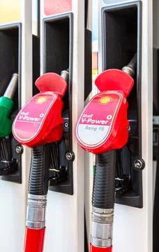 Filling column with different fuels at the Shell gas station Stock Photos