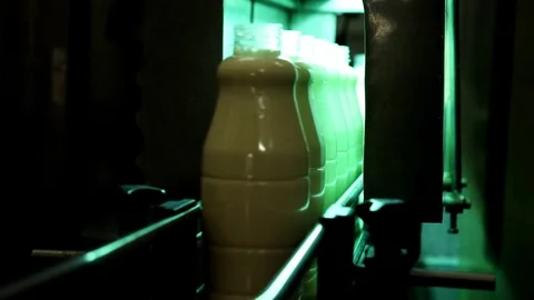 The filling of condensed milk in bottles 動画素材 73835114