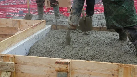 Filling of a coupler of a concrete floor with heating Stock Footage 99019743