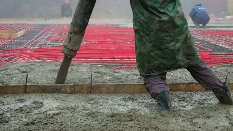 Filling of a coupler of a concrete floor with heating Video stock 99072670
