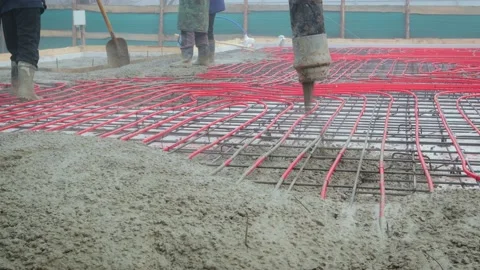 Filling of a coupler of a concrete floor with heating Vídeo Stock 99075423