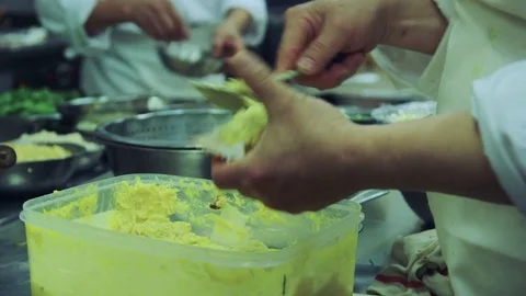 Filling crab shells with butter Stock Footage 78017406