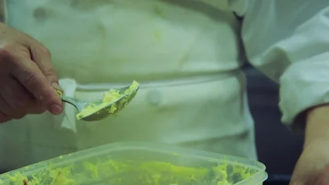 Filling crab shells with butter Stock Footage 78017818