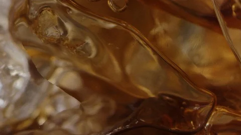 Filling up cup of ice with coffee macro shot 스톡 동영상 128491744