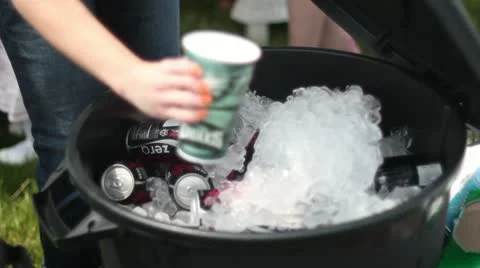 Filling cup with ice at outside party eagles cup ice chest 스톡 동영상 11150205